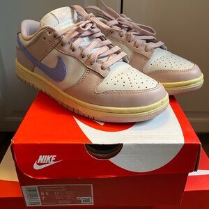 Light pink and yellow Nike dunks! Used but lightly worn.